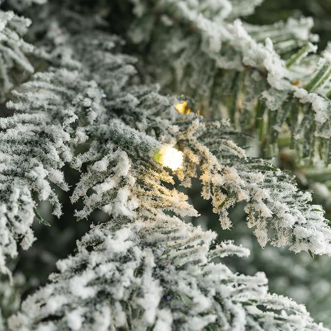 Glitzhome 9ft Prelit Christmas Tree, Artificial Christmas Tree with 470 Warm White Lights, Flocked Pencil Christmas Tree Chicago Frostwood Spruce w/1581 PE&PVC Branch Tips and Sturdy Metal Stand