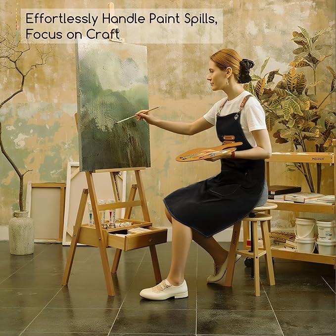 MEEDEN Painting Apron for Men Women: Adjustable Cross Back Waterproof Polyester Canvas Art Apron with 3 Pockets - Artist Apron for Acrylic Oil & Watercolor Painting, Gardening, Cooking - Black