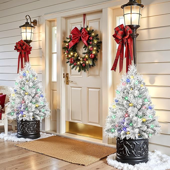 Set of 2 24.5 Inch Lighted Flocked Outdoor Christmas Tree with Multi-Color Lights, Timer, Battery Operated Pre-lit Scotch Pine Pathway Urn Filler with Pine Cones for Pathway & Porch& Yard Decorations