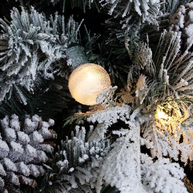 Darla 9ft Snow Flocked Prelit Artificial Christmas Tree with Star Projector, 58 Pine Cones, 1612 Branch Tips, 720 Warm Lights and Metal Stand, 58" Wide Snowy Frosted Pine Christmas Tree with Lights